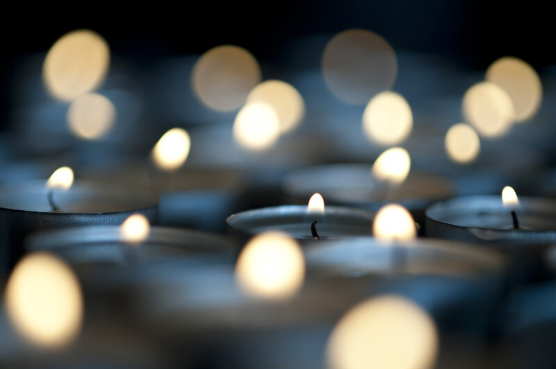 Lit Candles in Rows