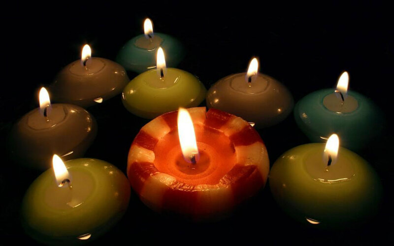 Lit Candles in Water