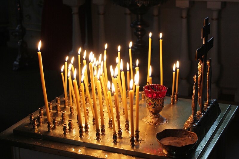 Lit Candles on a Stand