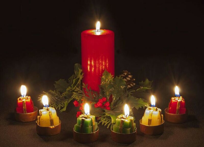 Lit Candles on Dark Surface — Red