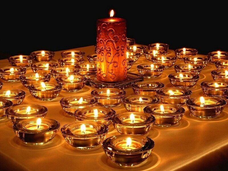 Lit Candles on Table — Gold