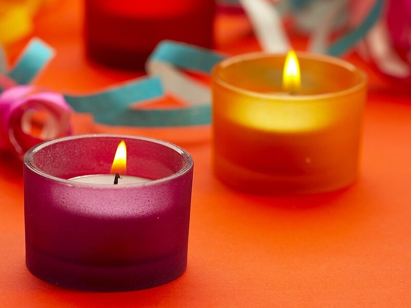 Lit Candles on Table — Orange