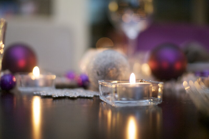 Lit Candles on Table — Purple