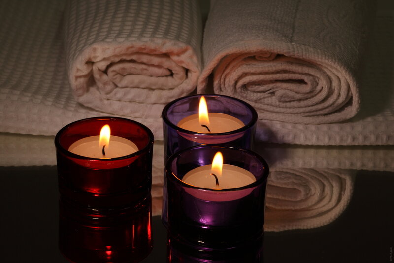 Lit Candles on Table — Red