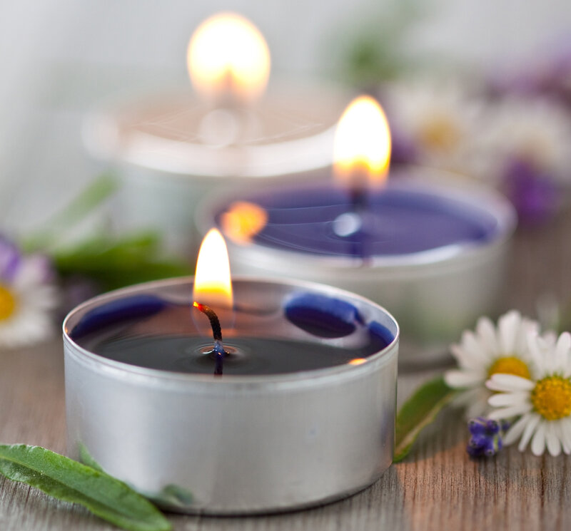Lit Candles on Wood