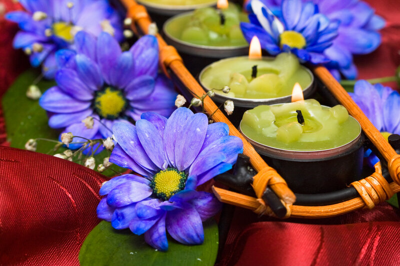 Lit Candles with Flowers
