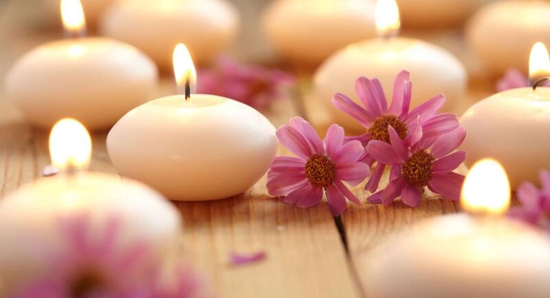 Lit Candles with Flowers — White