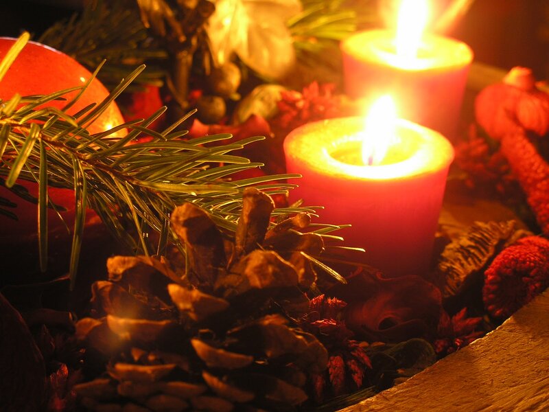 Lit Candles with Pine Cones