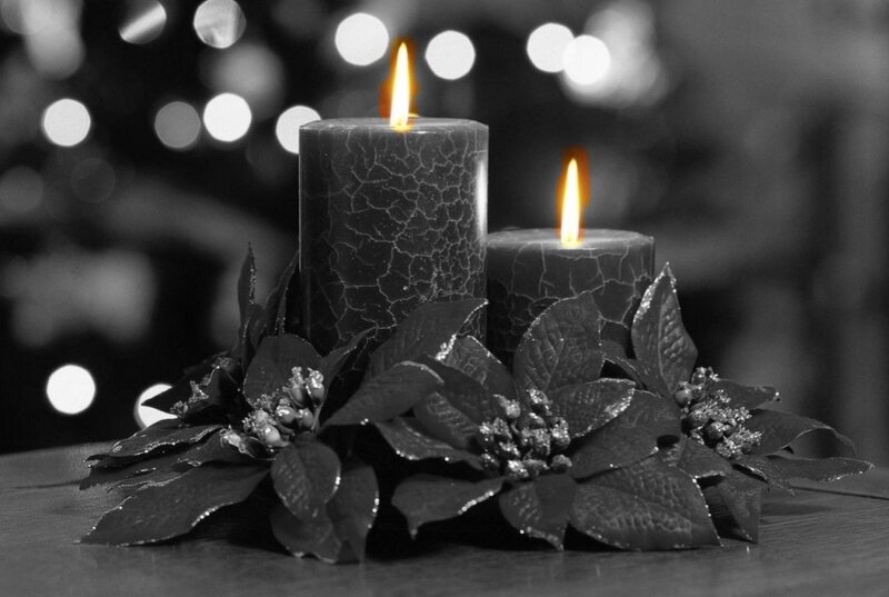 Lit Candles with Poinsettias