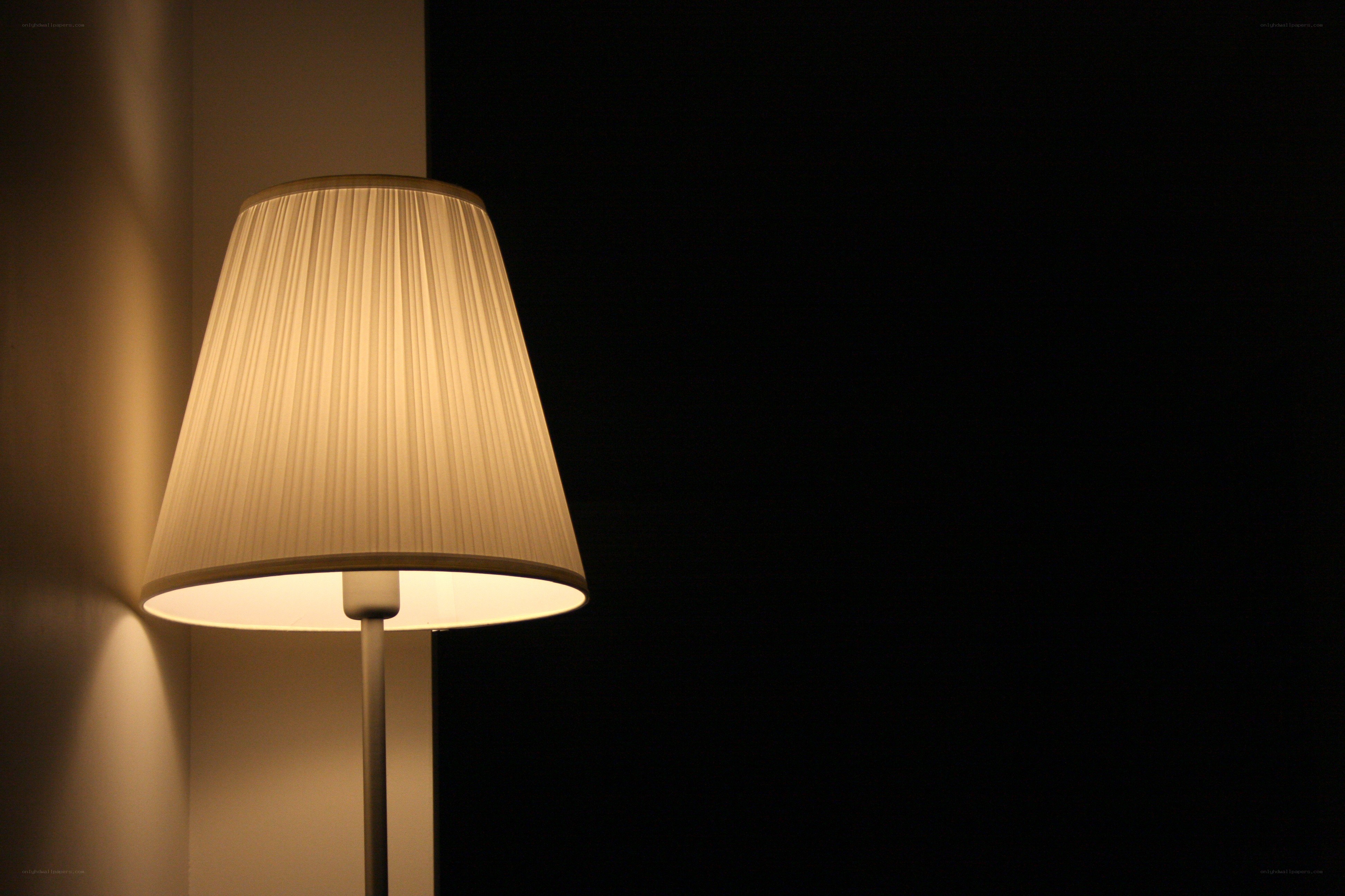lit lamp in dark room