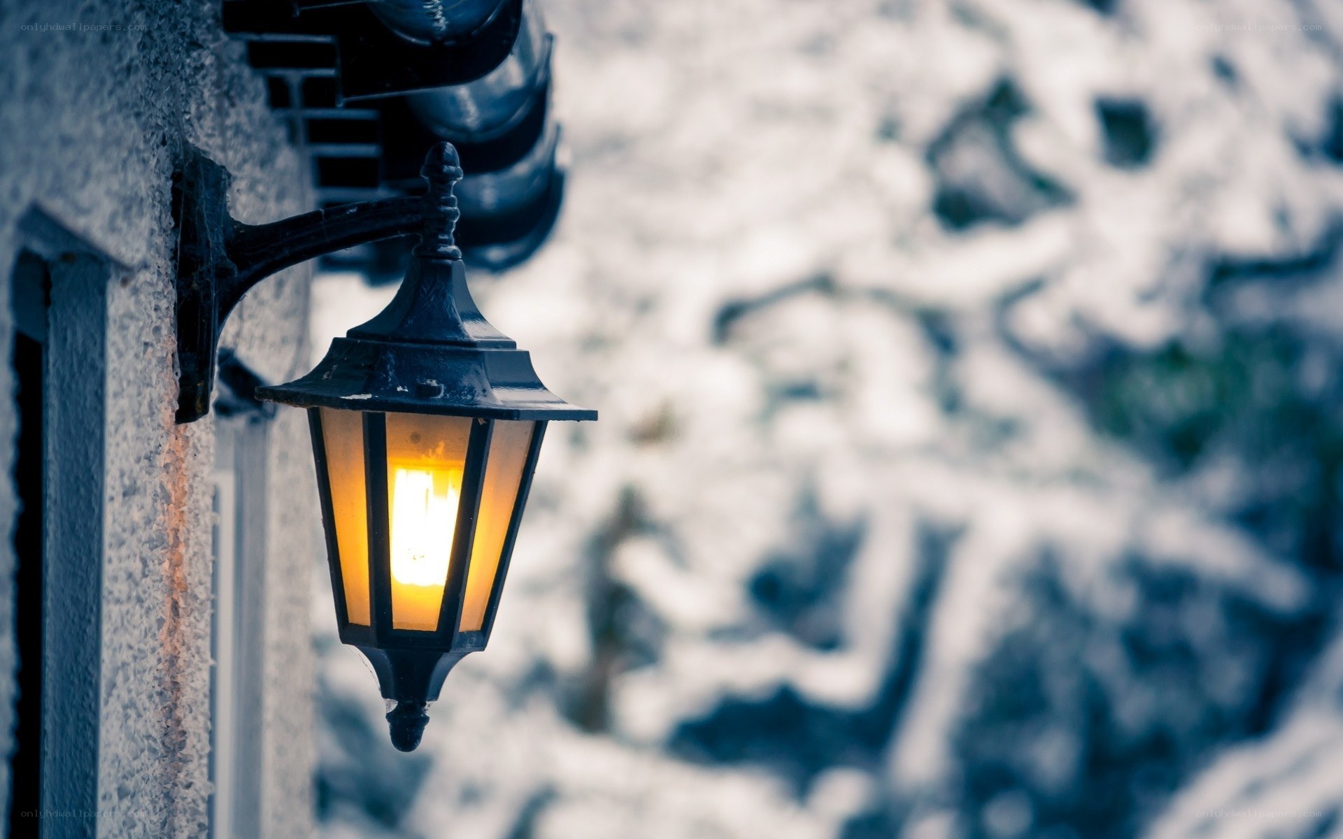 lit lamp in snowy scene