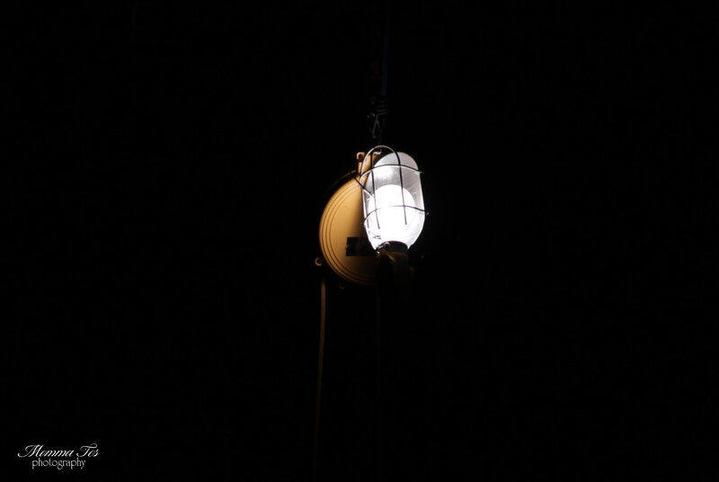 Lit Lantern in Darkness