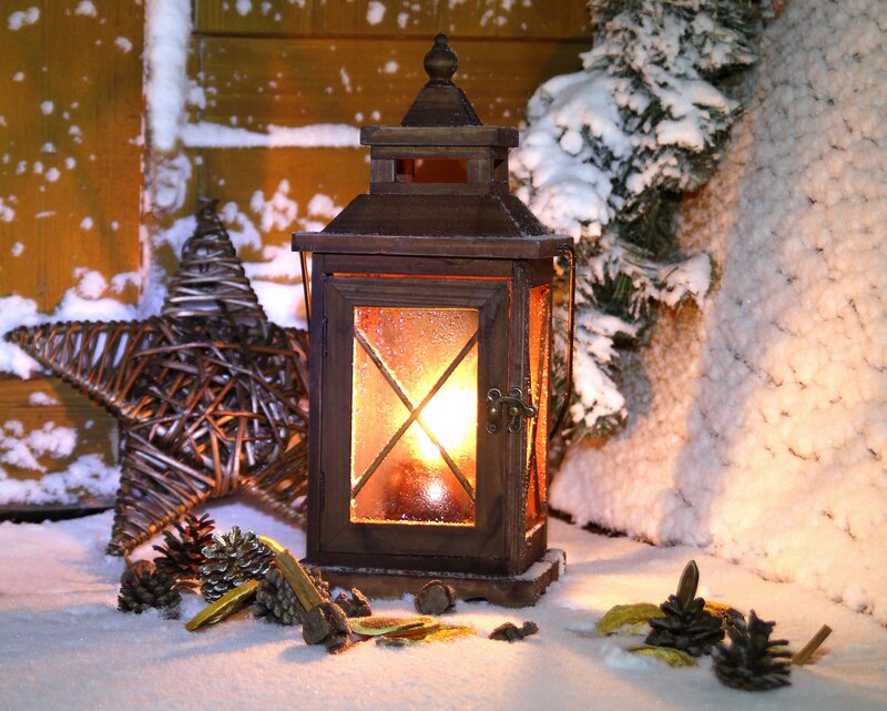 Lit Lantern in Snow