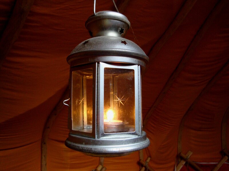 lit lantern in tent