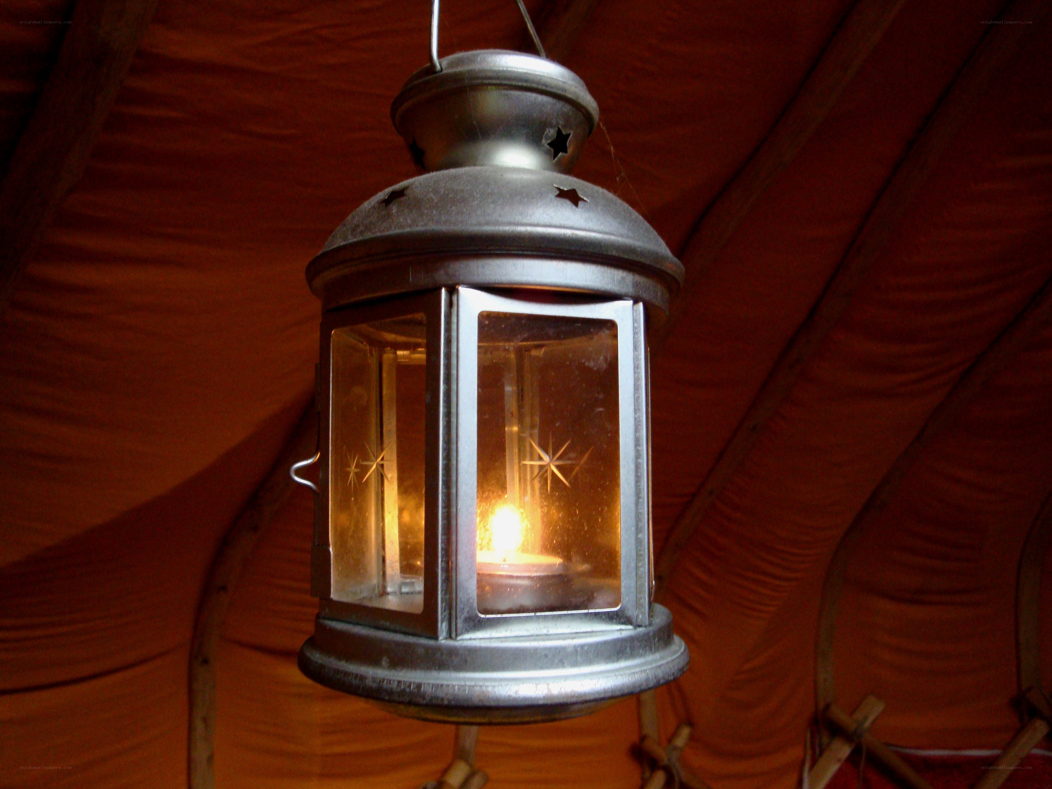 lit lantern in tent