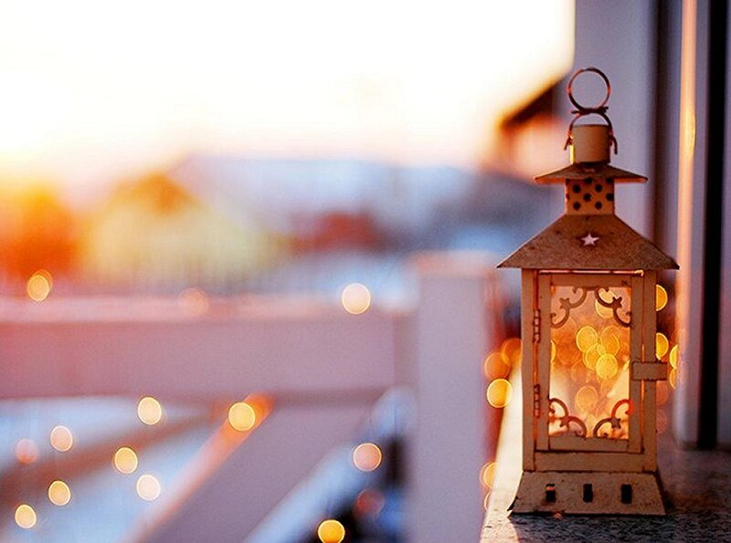Lit Lantern on Balcony