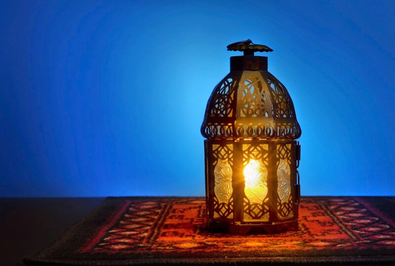 Lit Lantern on Rug