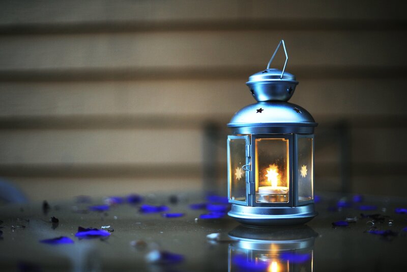 Lit Lantern on Table — Blue