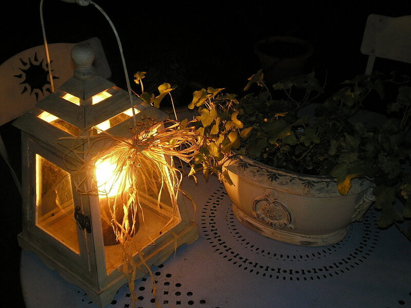 Lit Lantern on Table