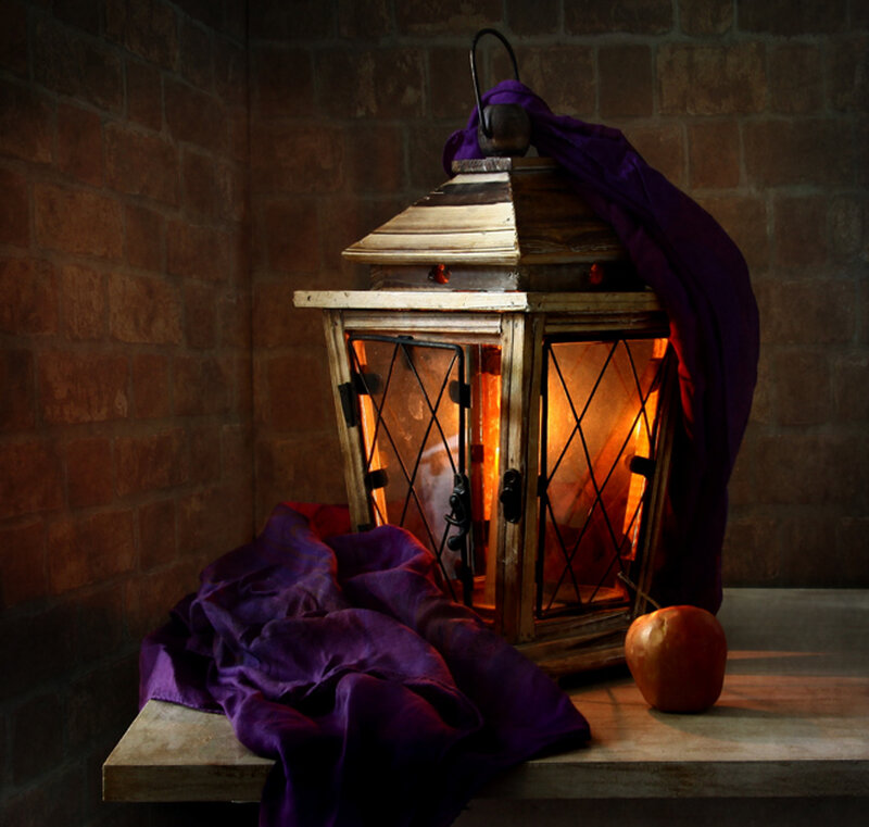 Lit Lantern with Apple