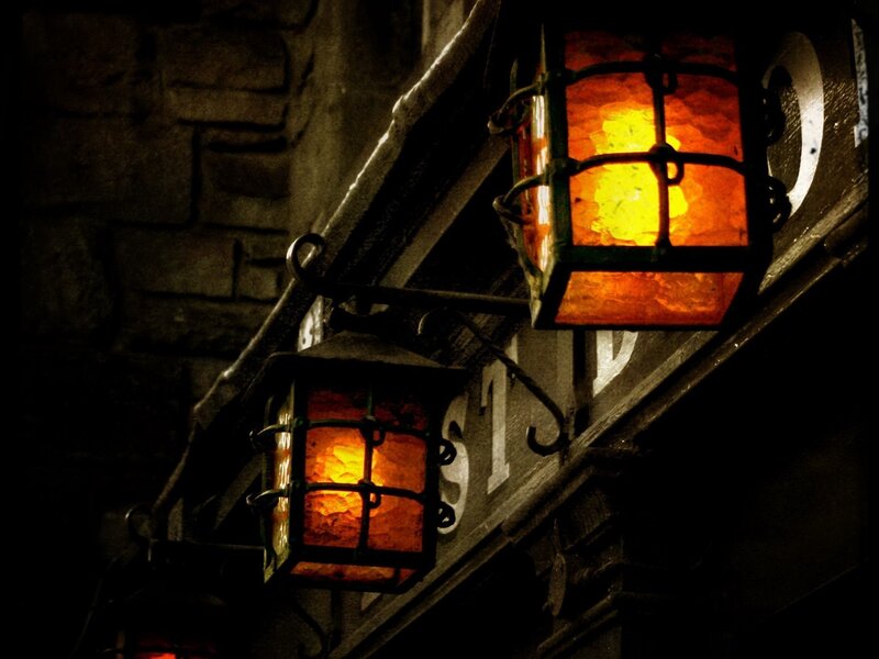 Lit Lanterns on Building — Orange
