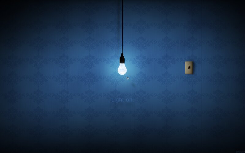 Lit Light Bulb on Wall