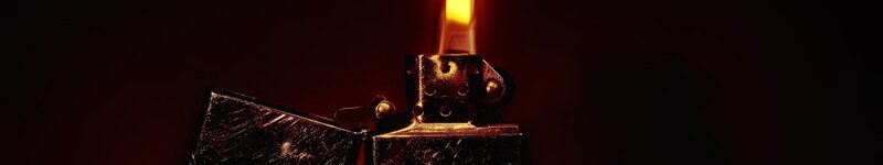 lit lighter in dark