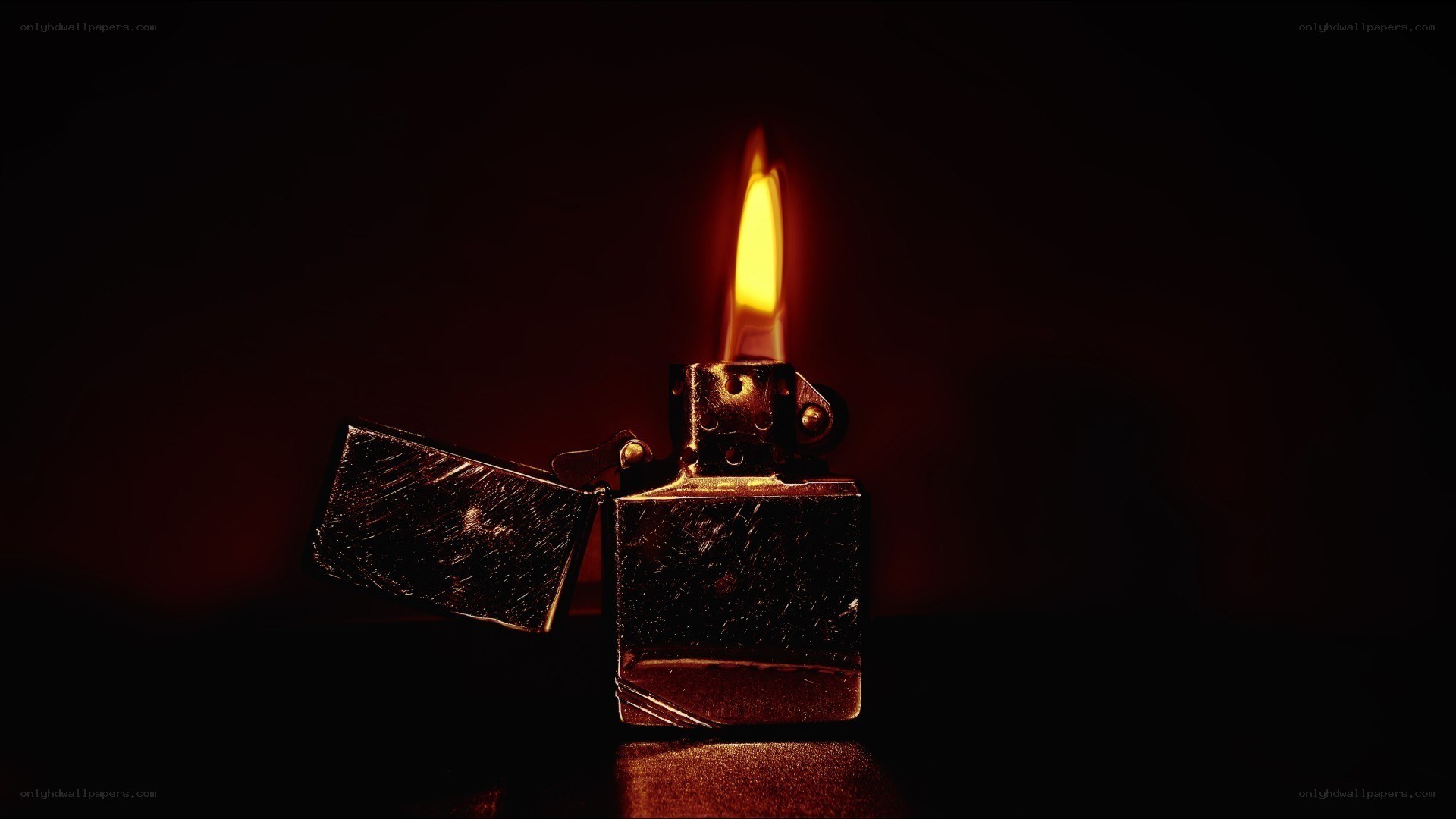 lit lighter in dark room