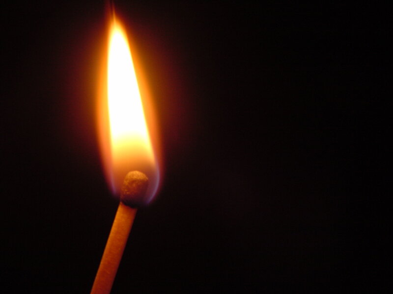 lit match flame