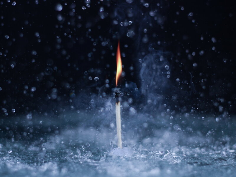 Lit Match in Water