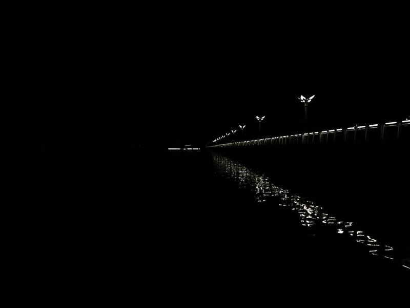 Lit Pier at Night