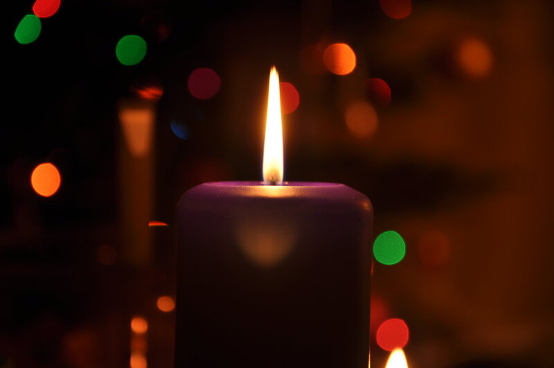 Lit Purple Candle — Calm