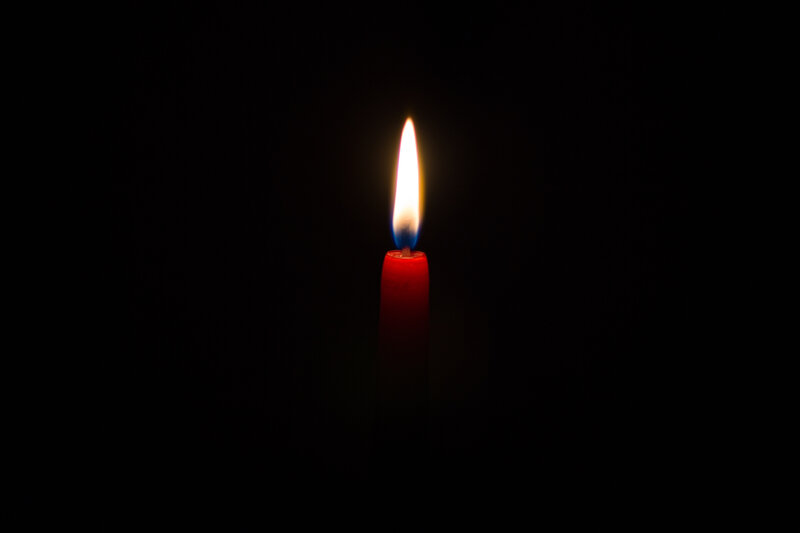 Lit Red Candle — Dramatic, Night, Photograph, Flame
