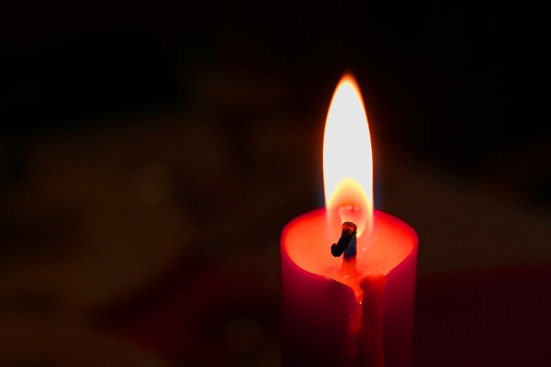 Lit Red Candle — Dramatic, Night, Photograph
