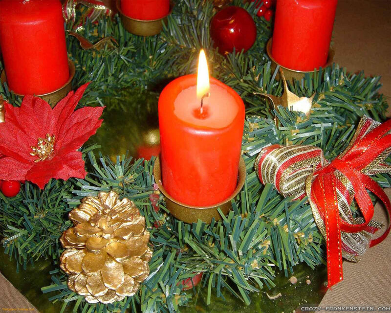 Lit Red Candle in Wreath