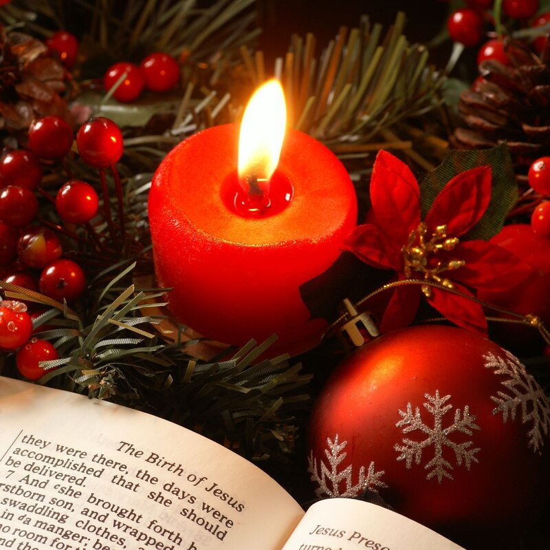 Lit Red Candle with Ornaments