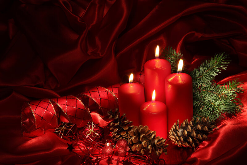 Lit Red Candles and Pinecones