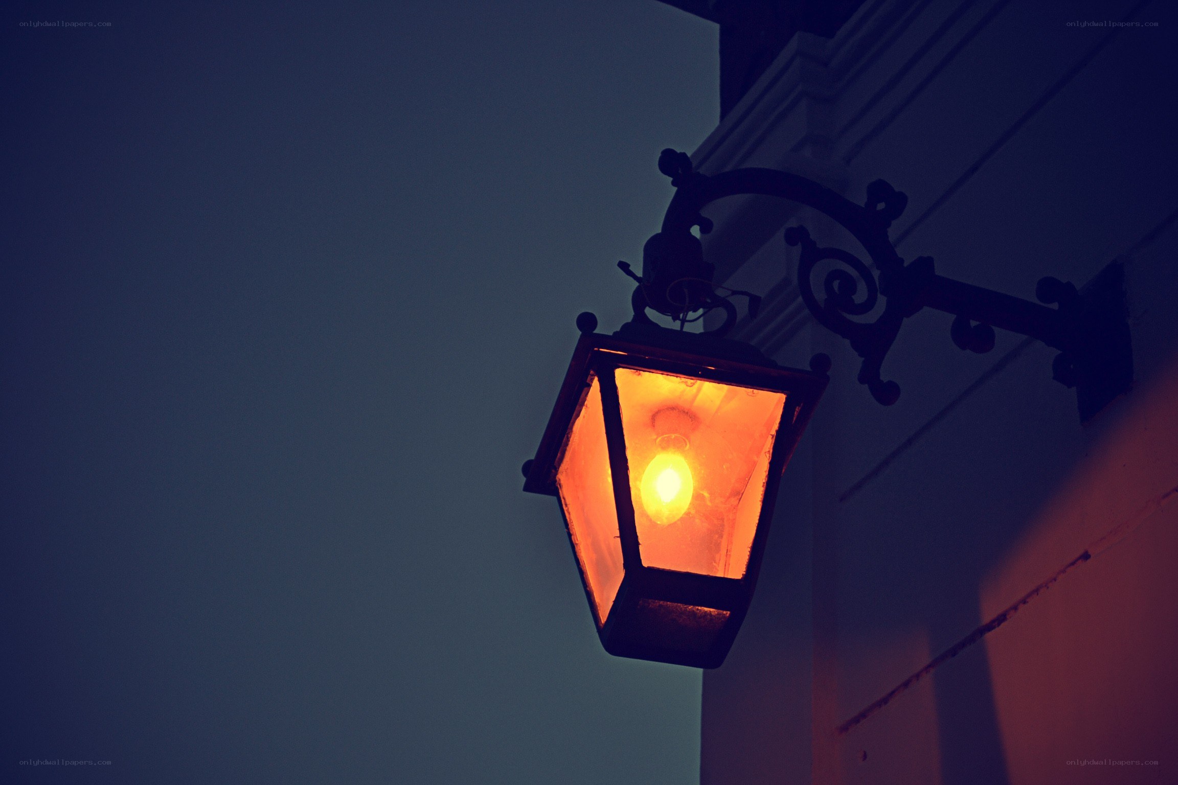 lit street lamp at dusk