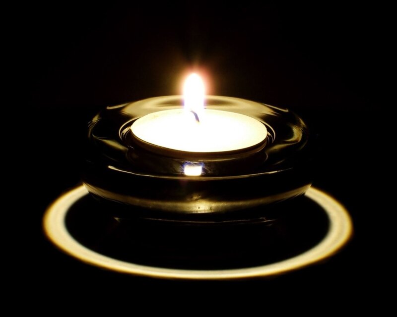 Lit Tea Light Candle
