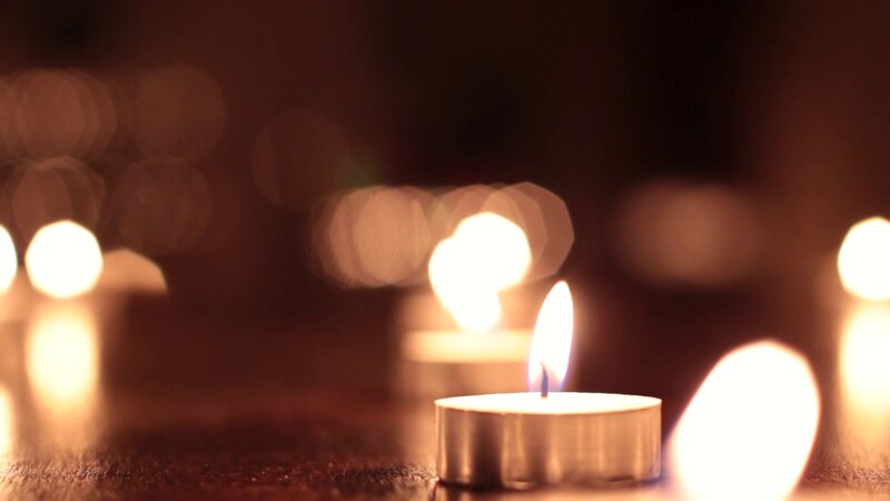 Lit Tea Light Candles — Brown