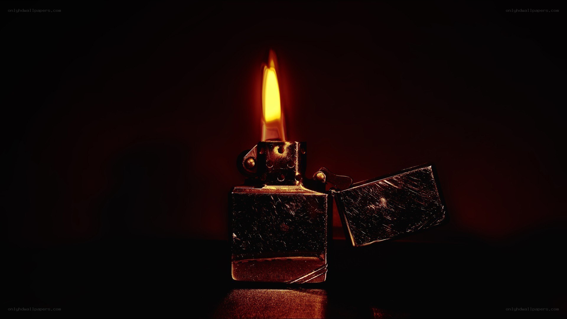 lit zippo lighter in dark