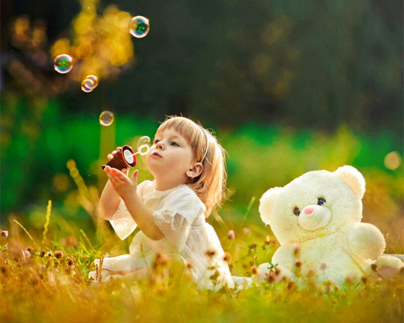 Little Girl Blowing Bubbles — Green