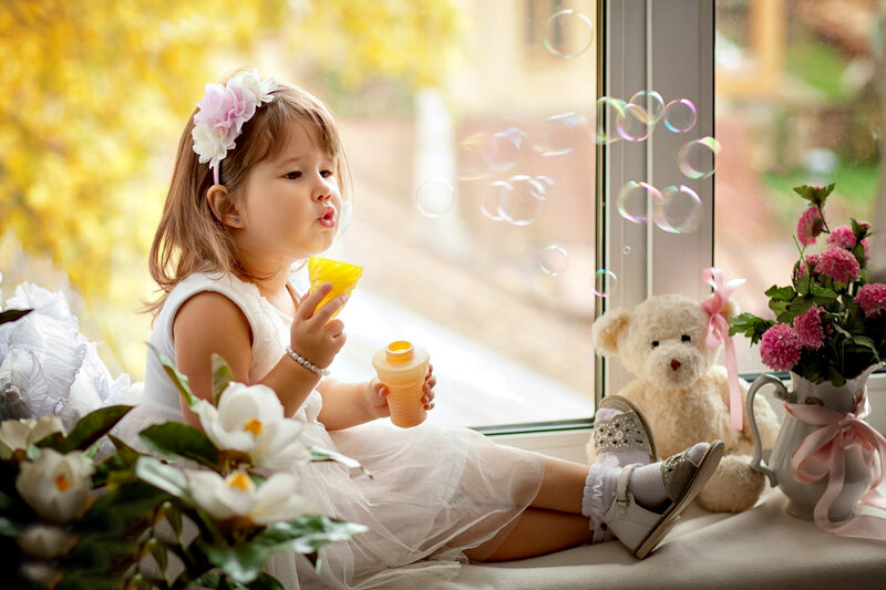 Little Girl Blowing Bubbles — White