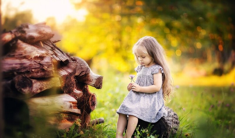 Little Girl Holding Flower — Green