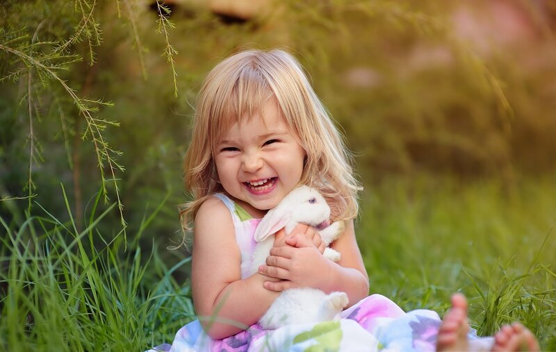 Little Girl Holding Rabbit — Green