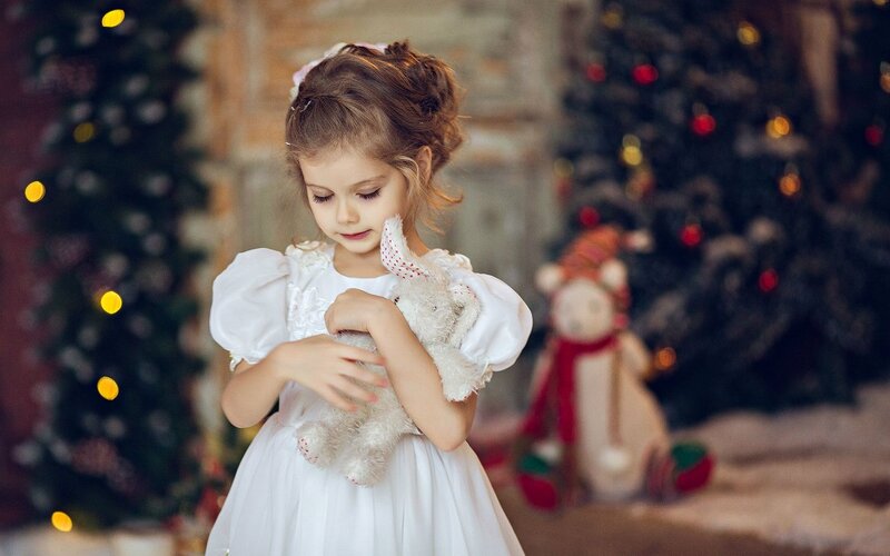Little Girl Holding Teddy Bear — White