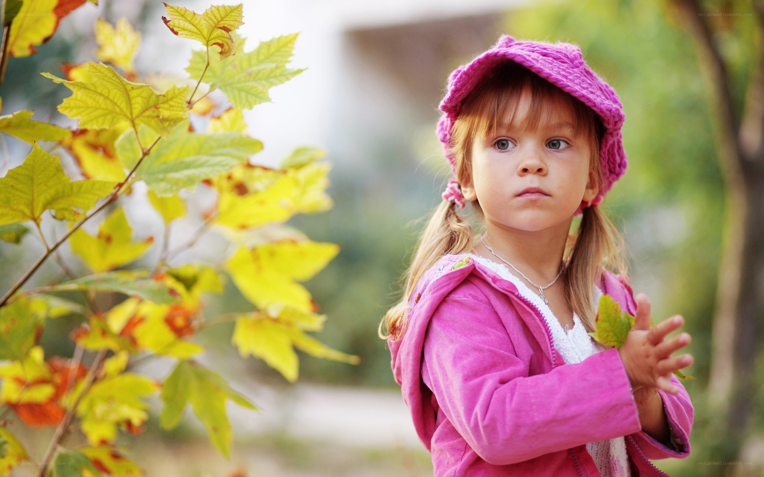 little girl in pink hat