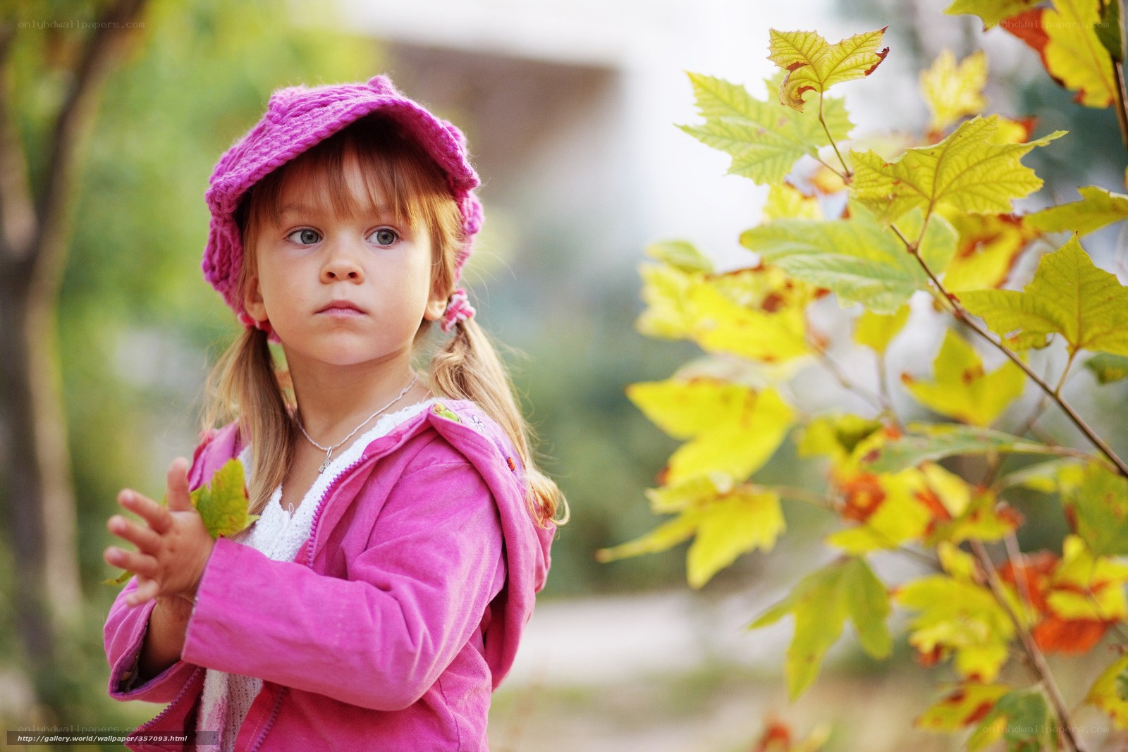 Little girl in pink outdoors