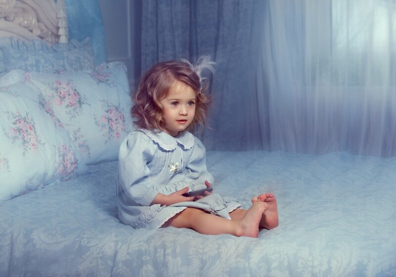 Little Girl on Bed — Blue