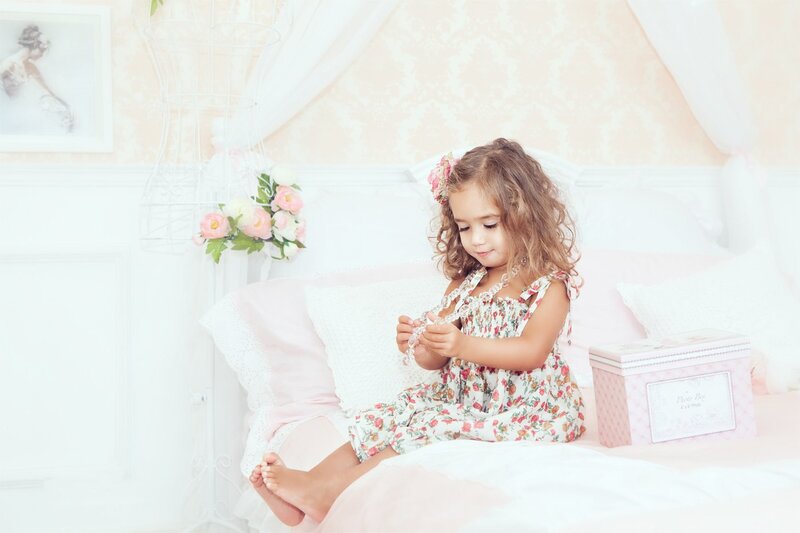 Little Girl on Bed — White, Serene